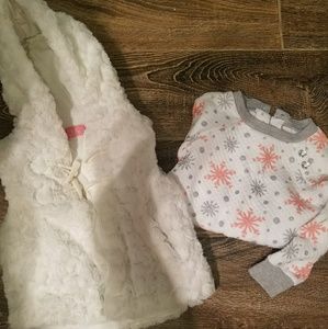 Sweatshirt and white fur vest